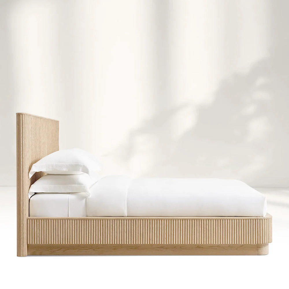 A well-planned bedroom furniture layout featuring balanced clearance zones and proportional storage